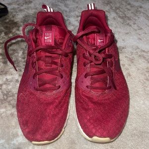 Maroon Nike sneakers